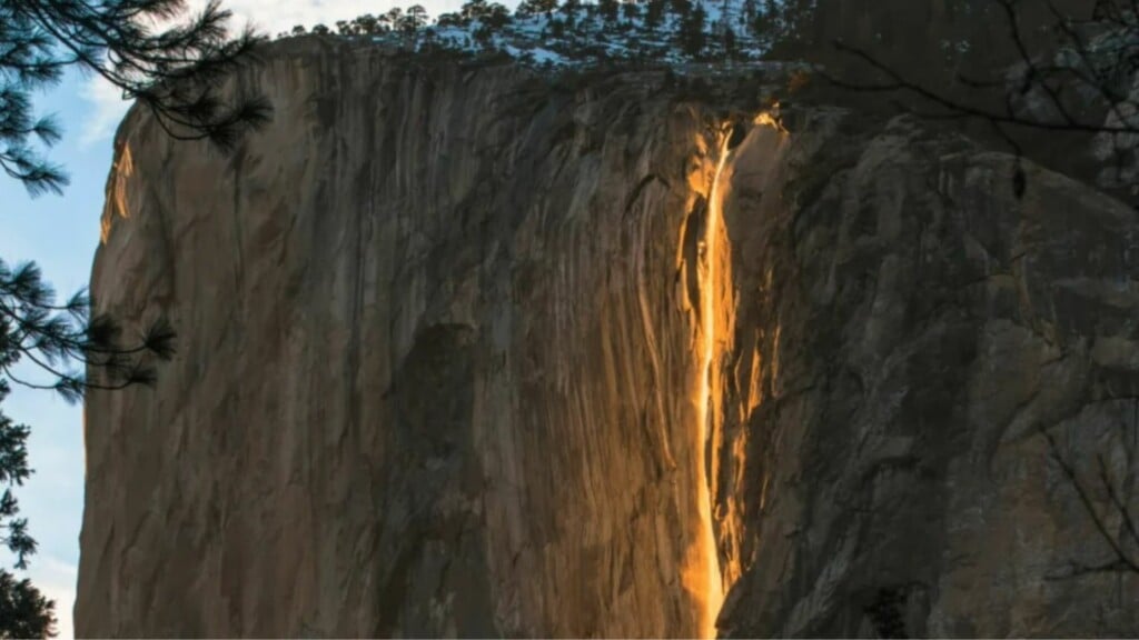 a photo of yosemite firefall cascading down