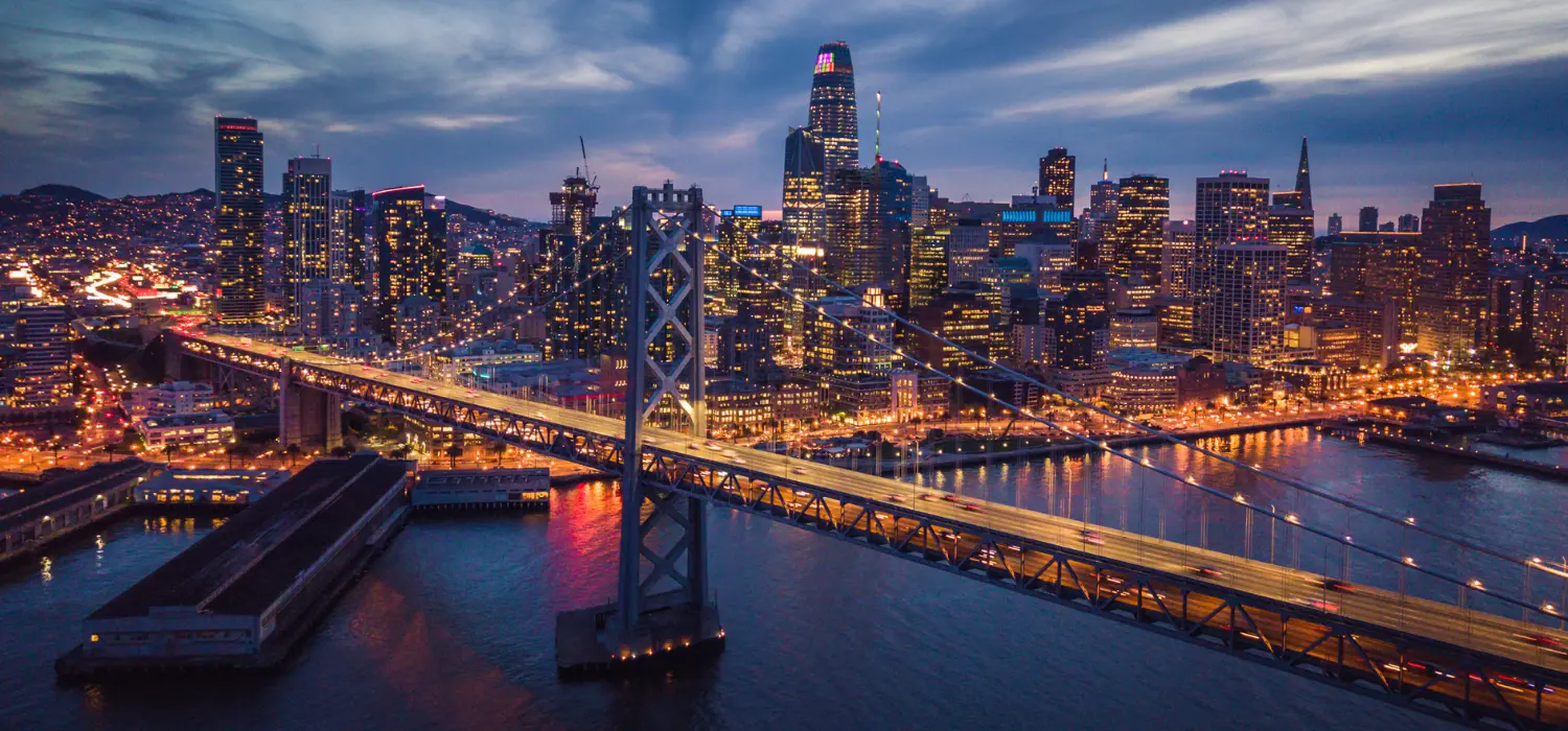 bay bridge view with night San Francisco on the background