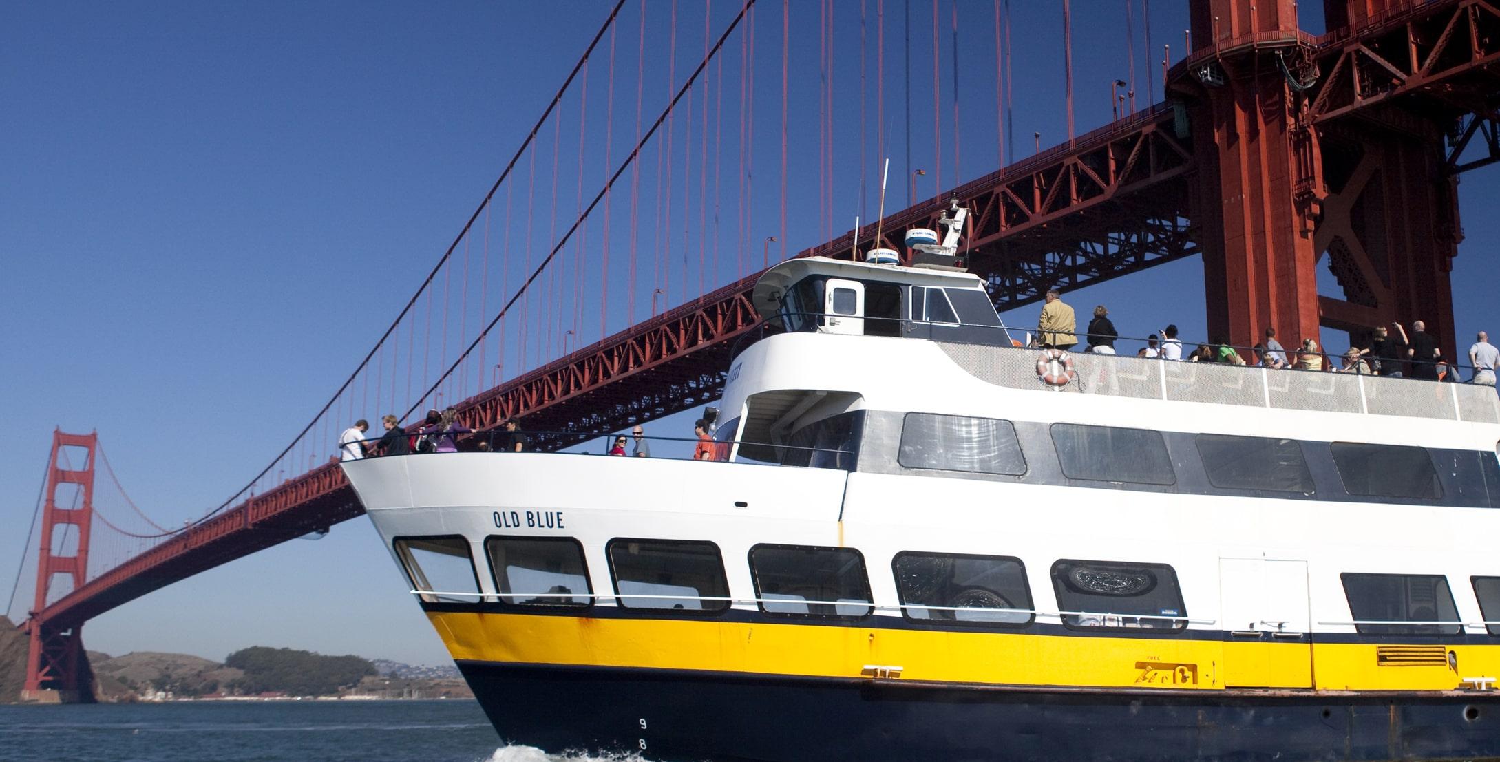 boat under the golden gate bridge