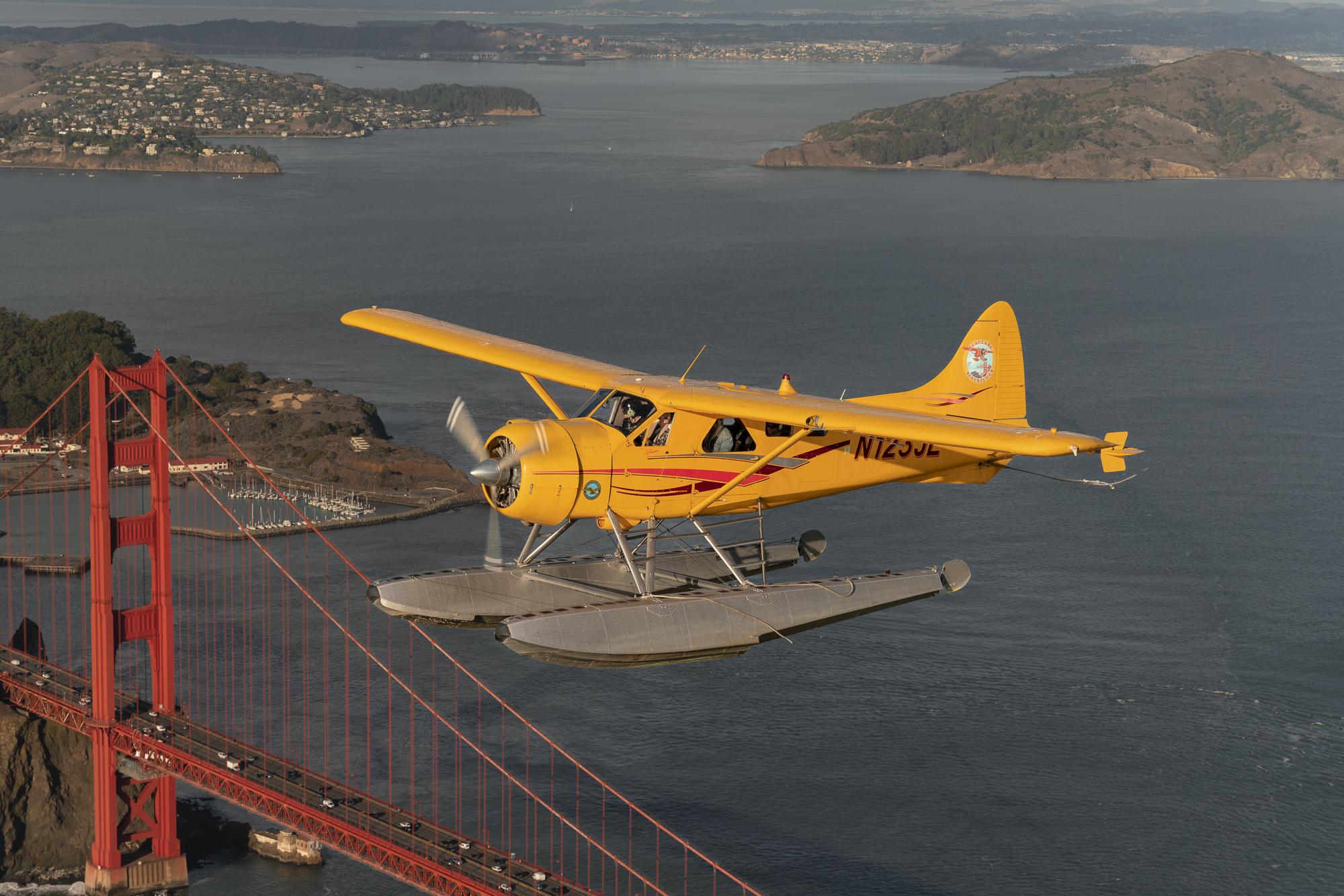 seaplane in front of golden gate bridge