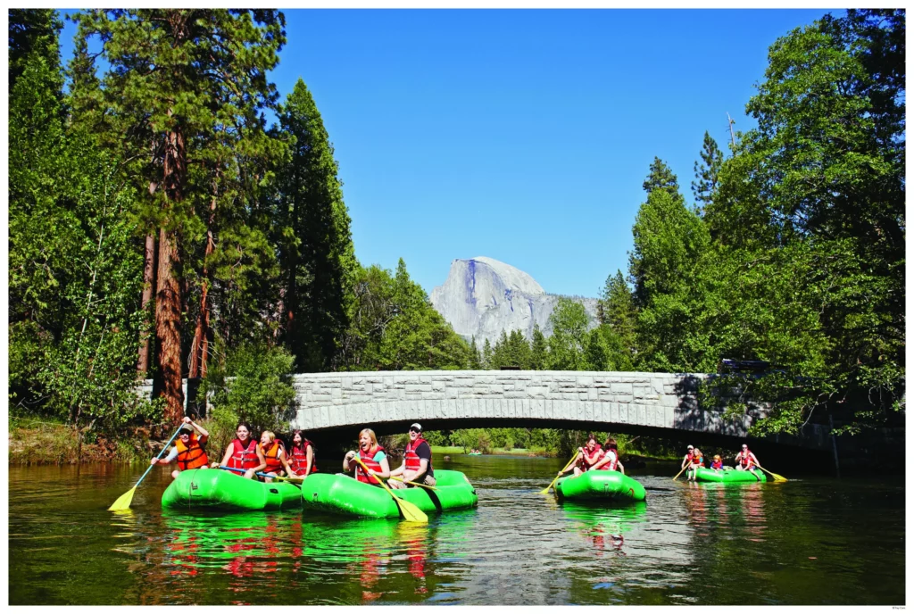 people rafting on the merced river 