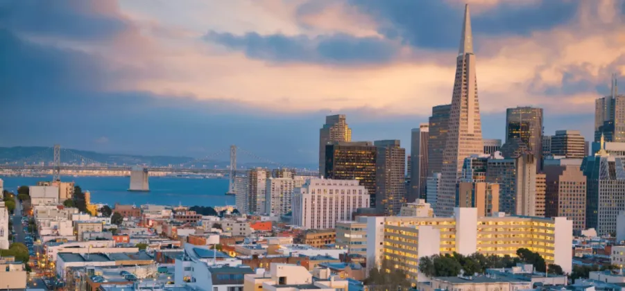 buildings and hotels in front of the bay  bridge 