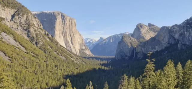 view of el capitan, a large mountain in Yosemite national park with distinctive features.