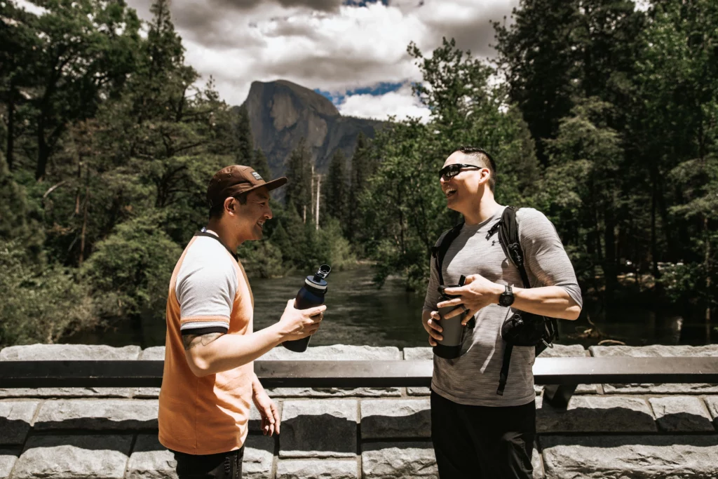 men drinking water on Sentinel bridge