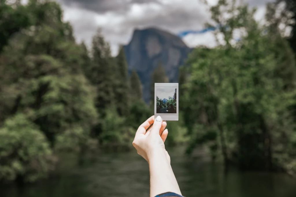 polaroid photo of half dome in front of half dome