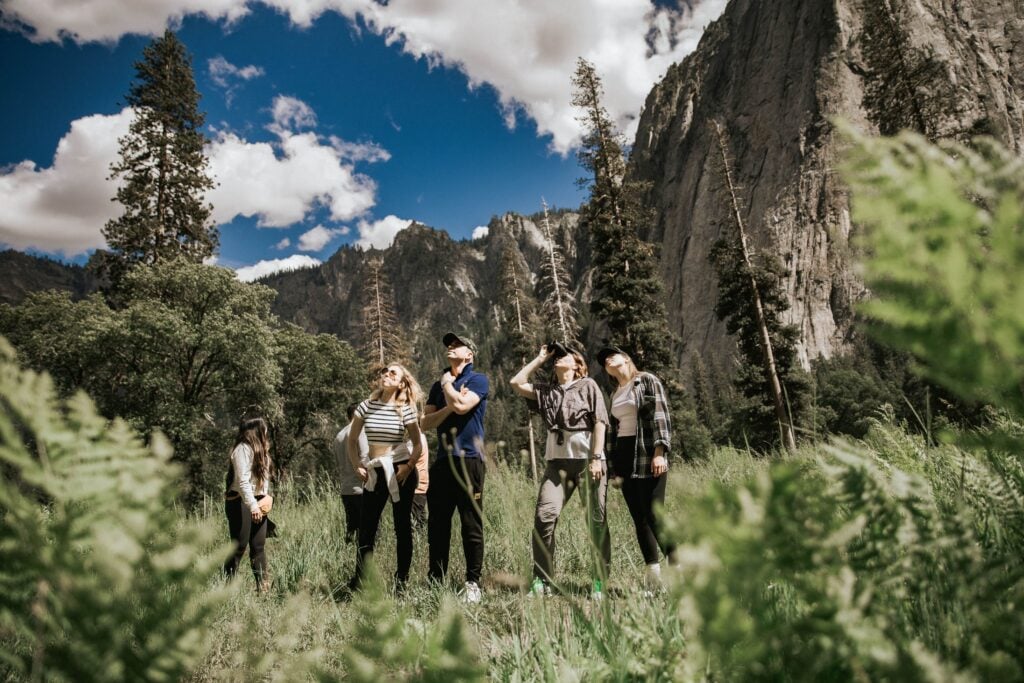 group of people in Yosemite Valley taking pictures