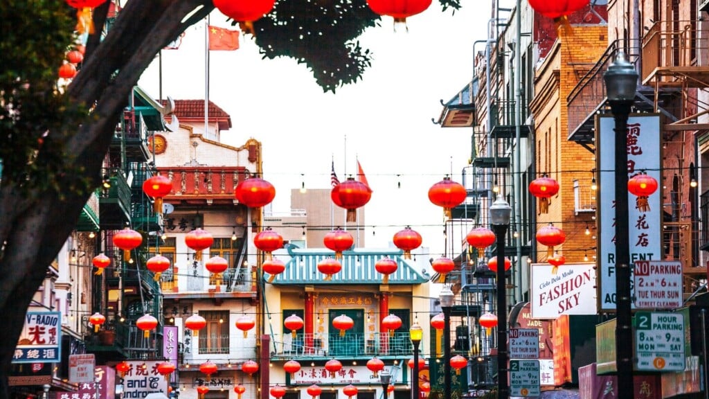 red lanterns hanging at a street during the fall in san francisco at daylight 