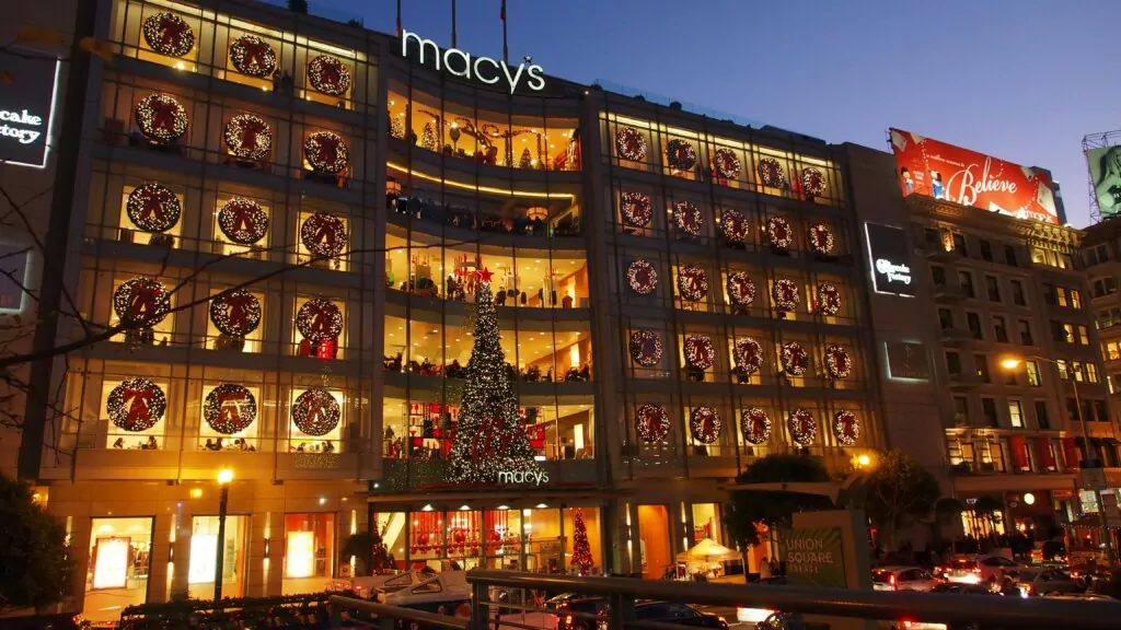 a photo of Macy's building with Christmas lights